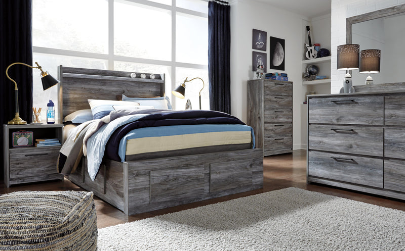 Ashley Furniture Baystorm Storage Bed with built-in drawers, featuring a modern wood finish and sleek design for bedroom storage.
