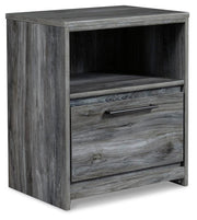 Ashley Furniture Baystorm nightstand with a dark wood finish, featuring a single drawer and open shelf for bedroom storage.