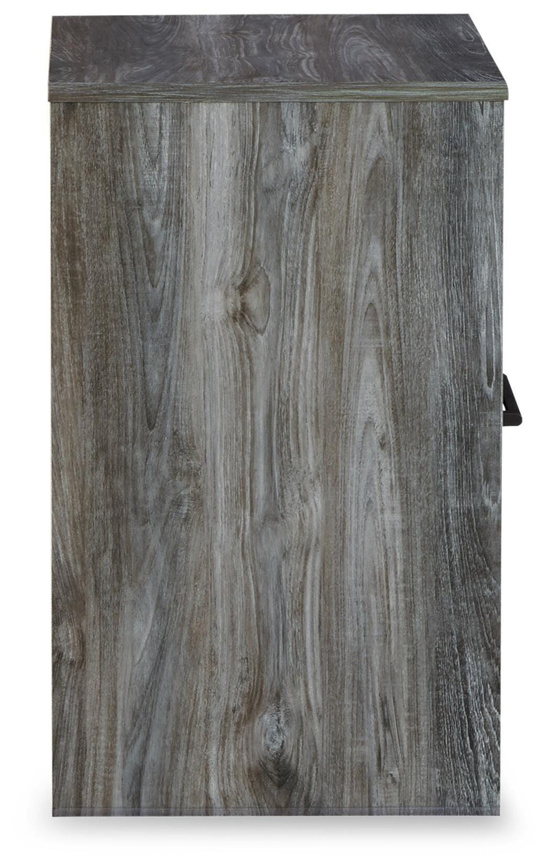 Ashley Furniture Baystorm nightstand with a dark wood finish, featuring a single drawer and open shelf for bedroom storage.