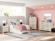 Ashley Furniture Lawroy Bed with a sturdy wooden frame and elegant design, shown in a stylish bedroom setting.