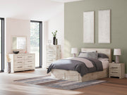 Ashley Furniture Lawroy Panel Storage Bed with a sleek design, showcasing the headboard and built-in storage drawers.
