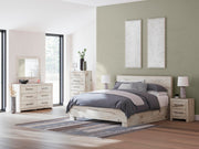 Ashley Furniture Lawroy Bed with a sleek wooden frame and neutral upholstered headboard, shown in a modern bedroom setting.