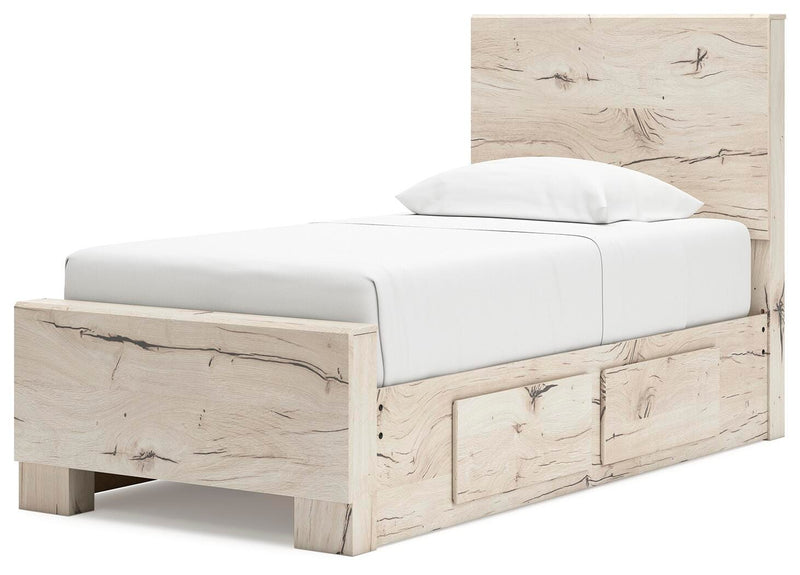 Ashley Furniture Lawroy Bed with a stylish upholstered headboard and modern design, shown from an angled side view.