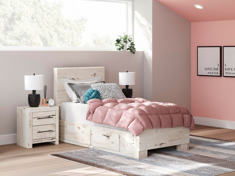 Ashley Furniture Lawroy Bed with a wooden frame and upholstered headboard, shown in a modern bedroom setting.