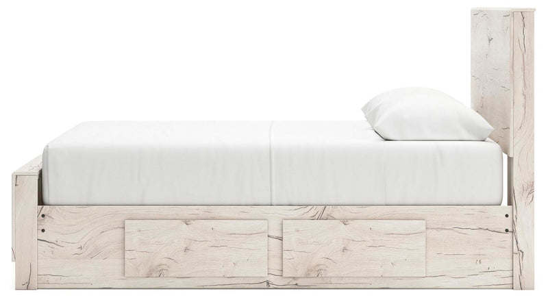 Ashley Furniture Lawroy Bed with a wood frame and upholstered headboard, shown in a warm, inviting bedroom setting.