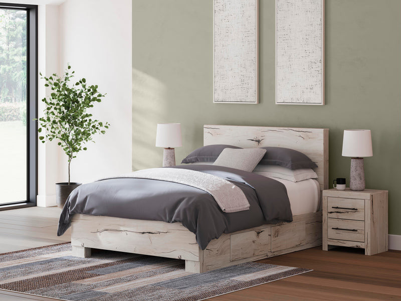 Ashley Furniture Lawroy Bed with a sleek, modern frame, showcasing a neutral-toned headboard and stylish bedding.