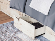 Close-up of a Lawroy Bed by Ashley Furniture, showcasing the detailed wood frame and elegant design features.