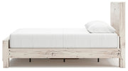 Ashley Furniture Lawroy Bed with a sleek wooden frame and neutral finish, showcasing a modern bedroom design.
