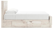 Ashley Furniture Lawroy Bed with a sleek wooden frame and upholstered headboard in a modern bedroom setting.