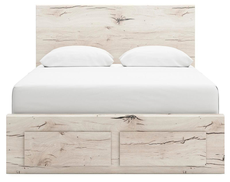 Ashley Furniture Lawroy panel storage bed with a wood finish, featuring a headboard and built-in storage drawers.