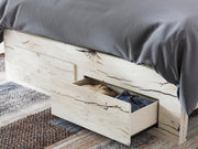 Ashley Furniture Lawroy panel storage bed with dark wood finish and built-in storage drawers, showcasing a modern bedroom design.