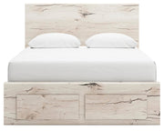 Ashley Furniture Lawroy Panel Storage Bed with headboard and storage drawers, shown from a front view in a modern bedroom setting.