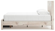 Ashley Furniture Lawroy Panel Storage Bed with sleek wooden panels and built-in storage drawers, shown from a side view.