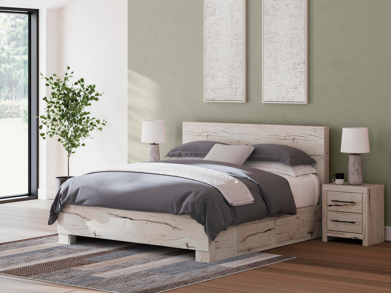 Ashley Furniture Lawroy Bed with upholstered headboard and wooden frame, shown in a modern bedroom setting.