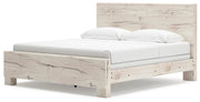 Ashley Furniture Lawroy bed with a sturdy wooden frame and elegant design, shown from an angled side view.