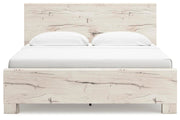 Ashley Furniture Lawroy Bed with upholstered headboard featuring fabric and nailhead trim, shown in a head-on view.