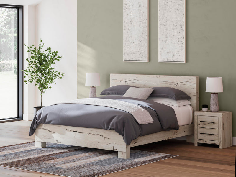 Ashley Furniture Lawroy Bed with a modern design, featuring a sturdy wooden frame and a stylish headboard for a contemporary bedroom look.
