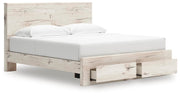 Ashley Furniture Lawroy Panel Storage Bed in warm wood finish, shown open to reveal built-in storage drawers and sleek design.
