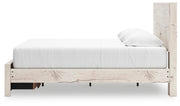 Ashley Furniture Lawroy Panel Storage Bed with sleek wooden frame and side storage drawers, shown from the side view.