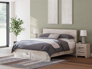 Ashley Furniture Lawroy Panel Storage Bed with built-in storage drawers and a modern wood finish, shown in a sleek bedroom setting.