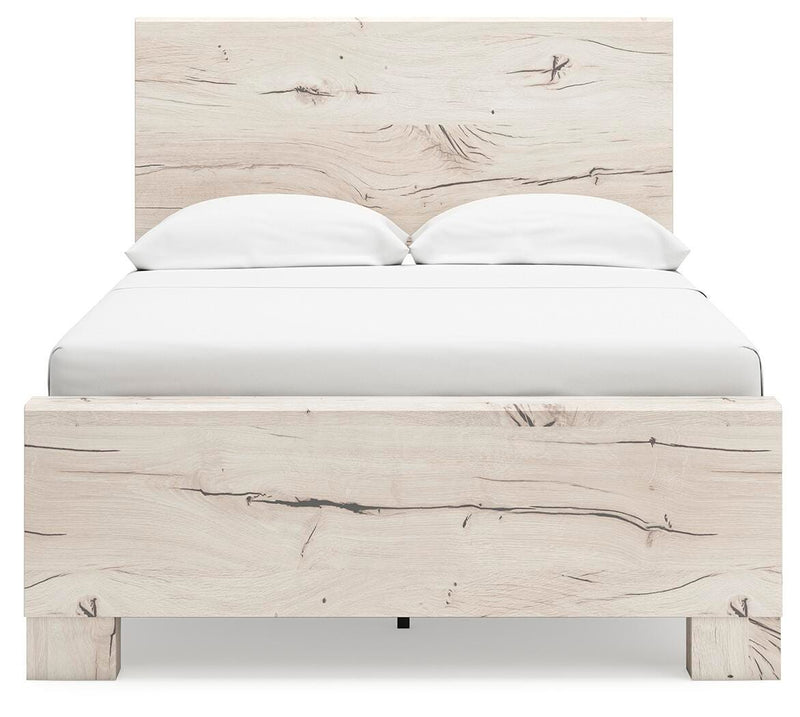 Ashley Furniture Lawroy Bed with upholstered headboard and wooden frame, shown in a head-on view.