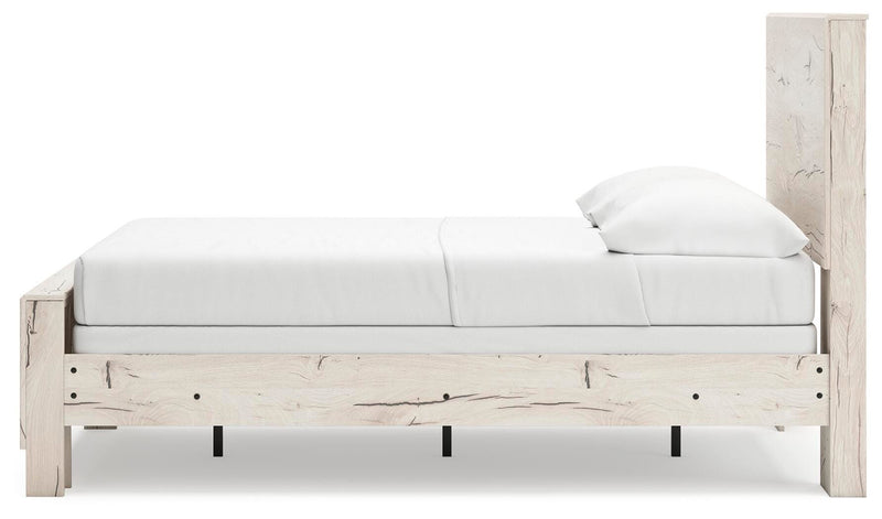 Ashley Furniture Lawroy Bed with a sleek frame and neutral upholstery, shown from a side angle in a modern bedroom setting.