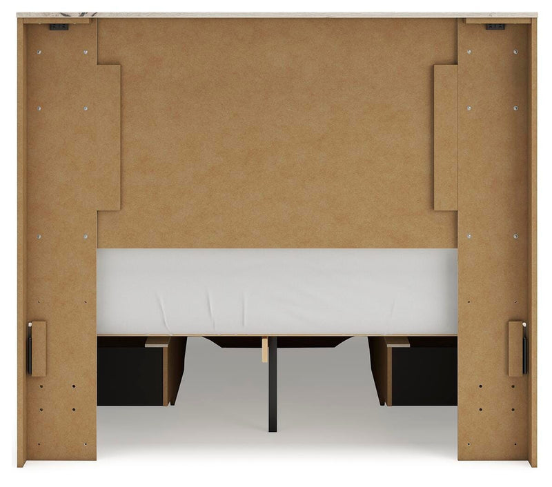 Ashley Furniture Lawroy Panel Storage Bed with sleek wood finish and built-in storage drawers, shown from the back.