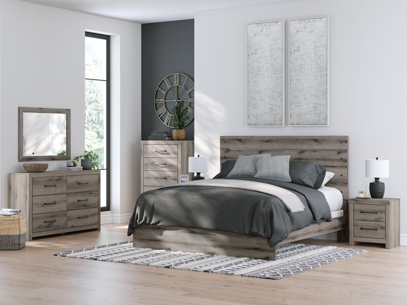 Graystorm dresser with matching mirror from Ashley Furniture, featuring a sleek gray finish and modern design.