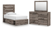 Graystorm bedroom set by Ashley Furniture featuring a gray upholstered bed frame and matching nightstands in a modern bedroom setting