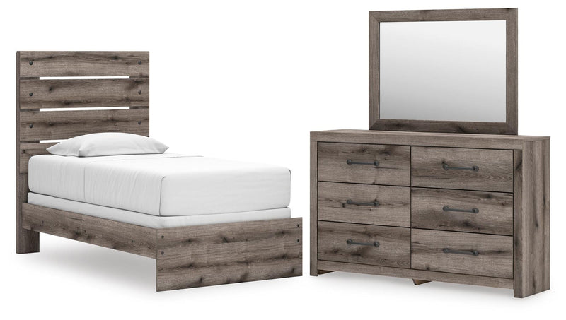 Graystorm bedroom set by Ashley Furniture featuring a complete bedroom furniture collection with a bed, nightstands, and dresser.