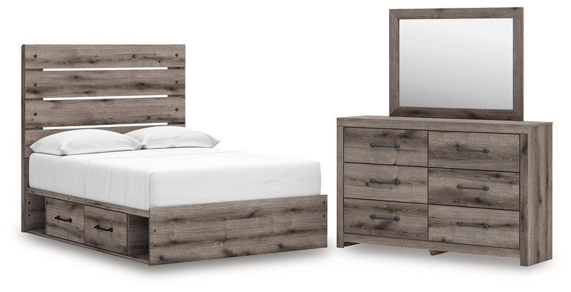 Graystorm bedroom set by Ashley Furniture featuring a bed, nightstands, and matching dresser in a modern gray finish.