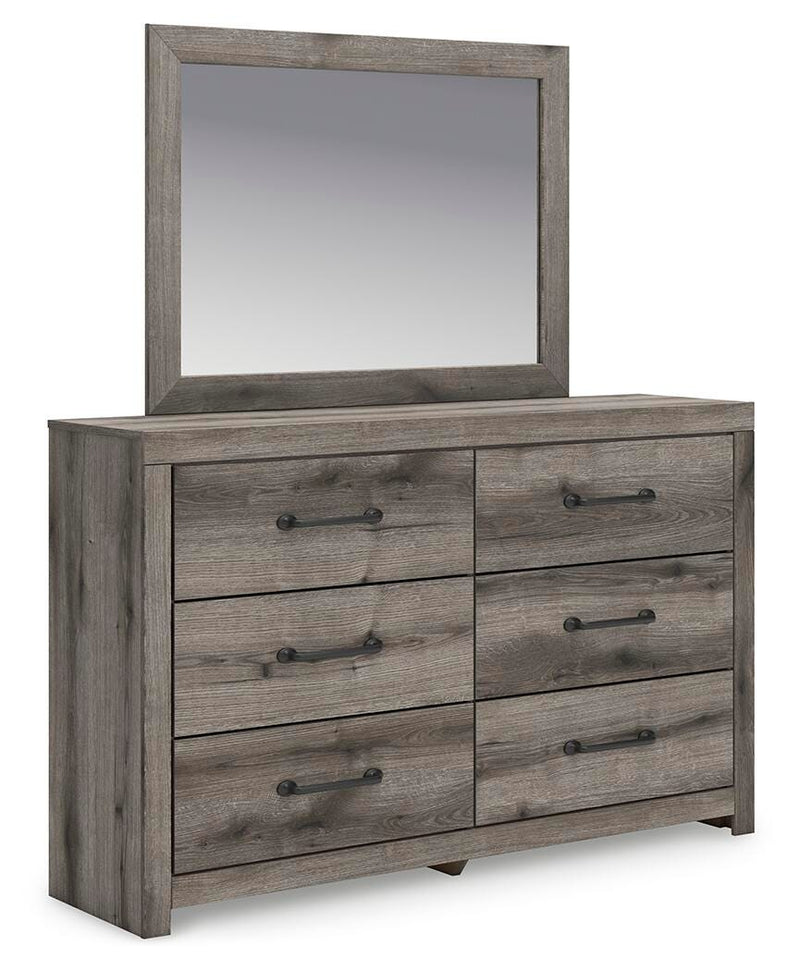 Graystorm bedroom set by Ashley Furniture, featuring a bed frame, nightstands, and dresser in a modern gray finish.
