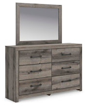 Graystorm bedroom set by Ashley Furniture, featuring a bed frame, nightstands, and matching dresser in a modern gray finish.