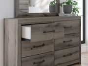Graystorm bedroom set by Ashley Furniture featuring a modern bed frame, matching nightstands, and a sleek wardrobe.