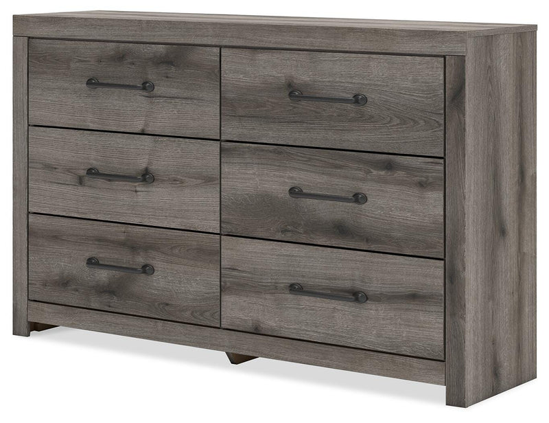 Graystorm dresser and mirror set by Ashley Furniture, featuring a modern gray finish and sleek design, shown from an angled view.
