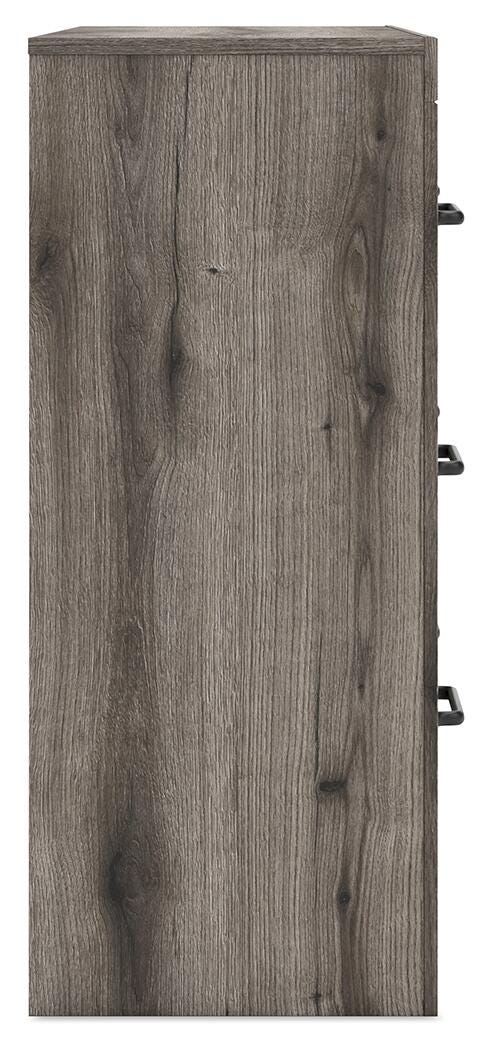 Graystorm dresser with matching mirror from Ashley Furniture, featuring sleek gray finish and modern design.