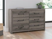 Gray Ashley Furniture dresser and mirror set with sleek design, featuring ample storage and a matching mirror for a modern bedroom look.