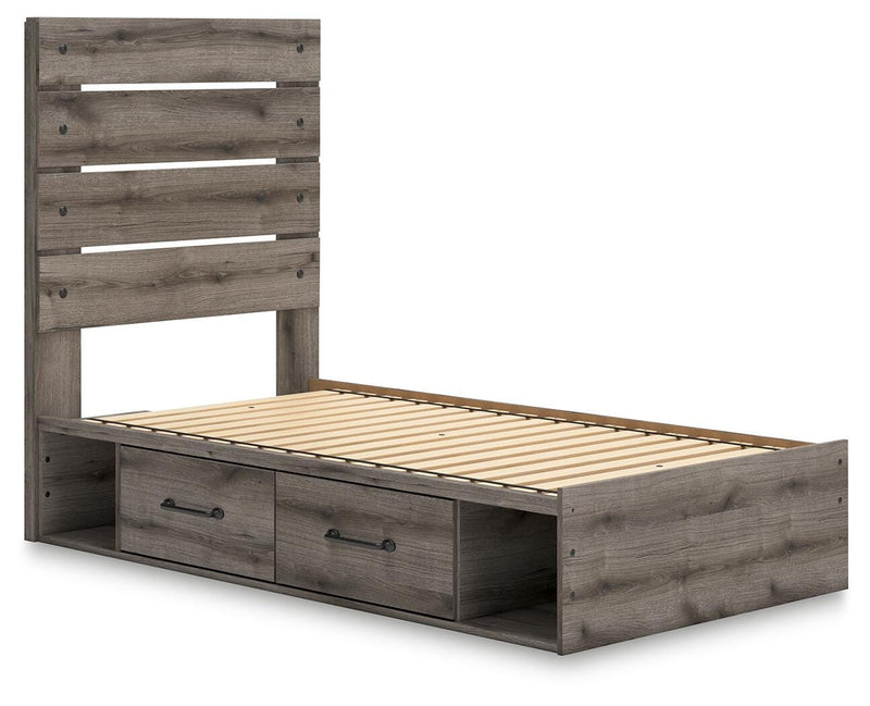 Graystorm Ashley Furniture bed with built-in storage drawers, featuring a modern design and a sturdy wooden frame.
