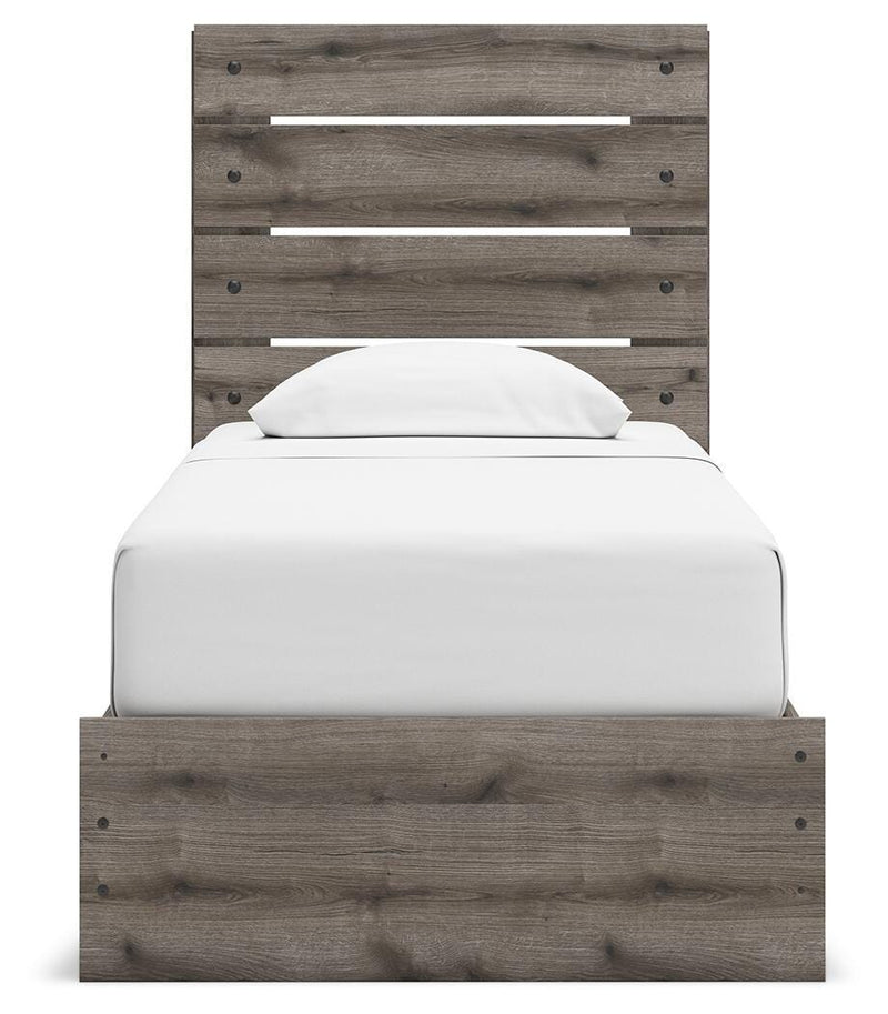 Graystorm bedroom set by Ashley Furniture, featuring a bed with a headboard and matching bedroom furniture in a modern gray design.