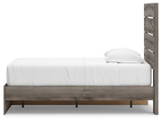 Graystorm Bed with Storage by Ashley Furniture, showcasing a modern bed frame with built-in storage drawers and a sleek gray finish.