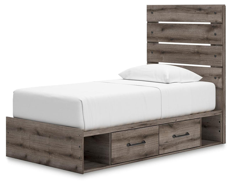 Graystorm bed with storage drawers from Ashley Furniture, shown in a stylish gray finish with a modern design.
