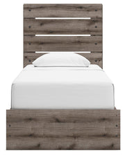 Graystorm Bed with Storage by Ashley Furniture featuring a modern gray bed frame with built-in storage drawers and headboard.