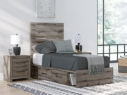 Graystorm bed with storage by Ashley Furniture, featuring a modern gray bed frame with built-in storage drawers.