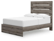 Graystorm bed with storage drawers by Ashley Furniture, shown from an angled side view highlighting the bed frame and storage features.