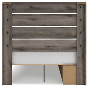 Graystorm Ashley Furniture bed with built-in storage drawers and a modern design, shown in a bedroom setting.