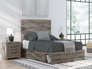 Graystorm bed with storage drawers by Ashley Furniture, featuring a modern gray finish and built-in under-bed storage.