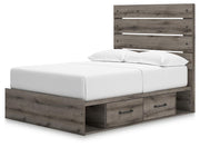 Graystorm bed with storage drawers by Ashley Furniture, showcasing a modern gray upholstered design with built-in storage options.