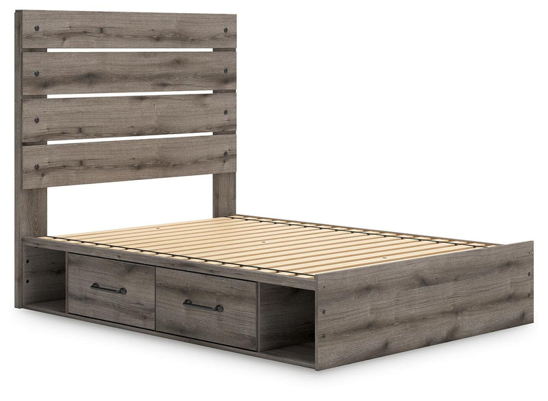 Graystorm Bed with Storage by Ashley Furniture, featuring a modern gray bed frame with built-in storage drawers and angled design.