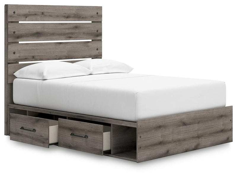 Graystorm Bed with Storage by Ashley Furniture, angled open view showing the bed frame and built-in storage drawers.