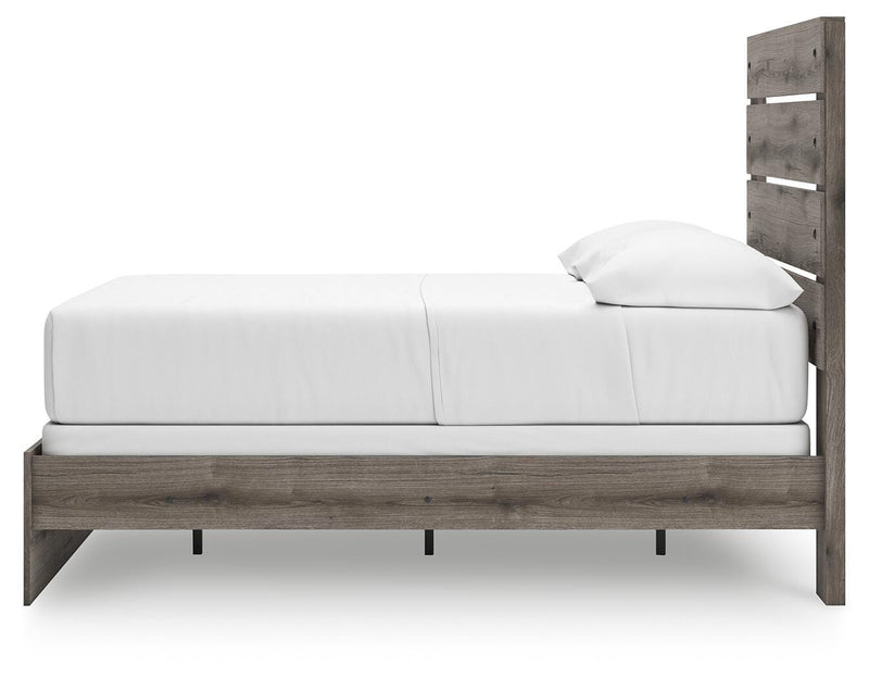 Graystorm bedroom set by Ashley Furniture featuring a modern bed frame and matching nightstands in a sleek gray finish.